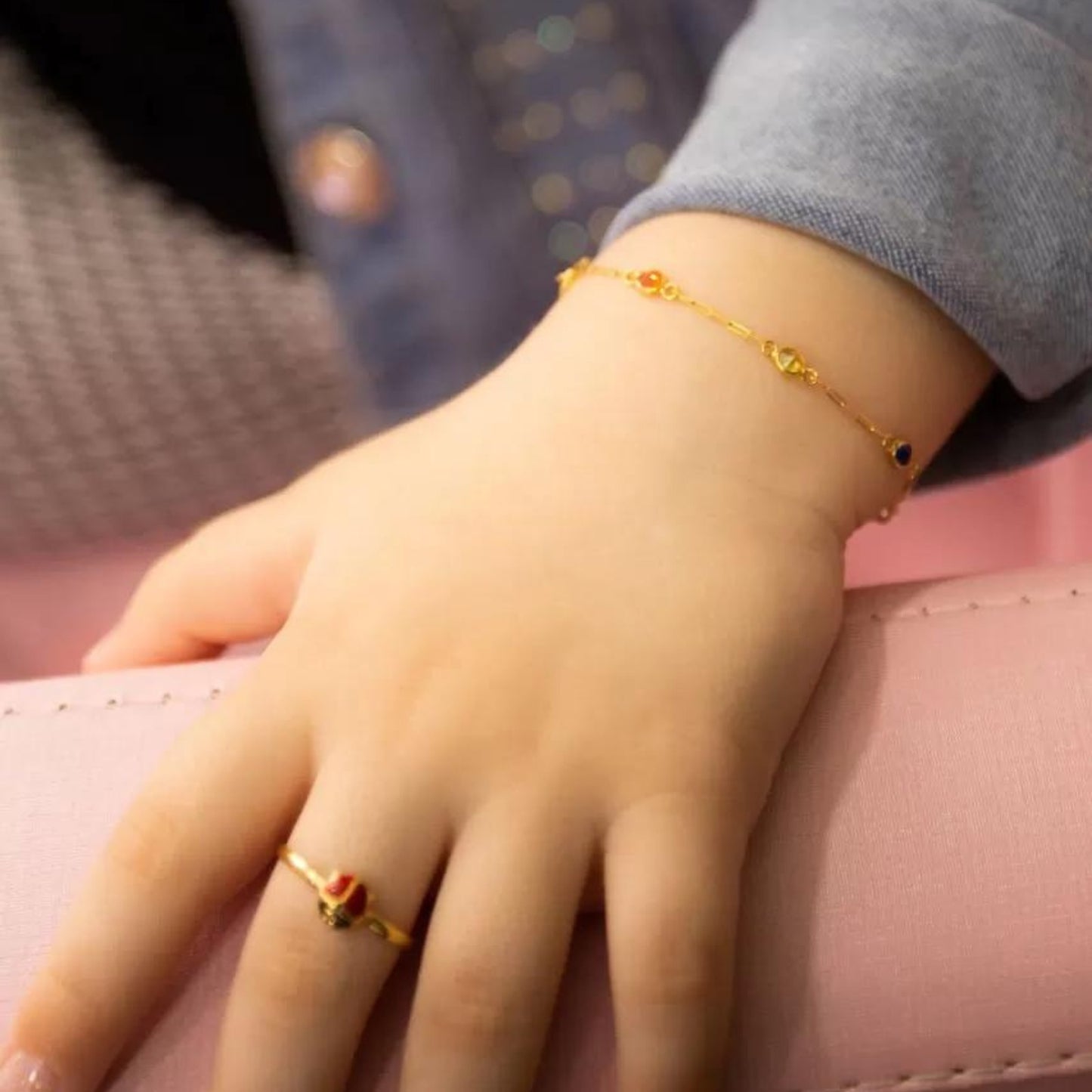 Pulseira infantil em Ouro Amarelo 18K, com zirconias coloridas