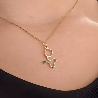 Pingente Estetoscópio em Ouro Amarelo 18K-750, com esmeralda