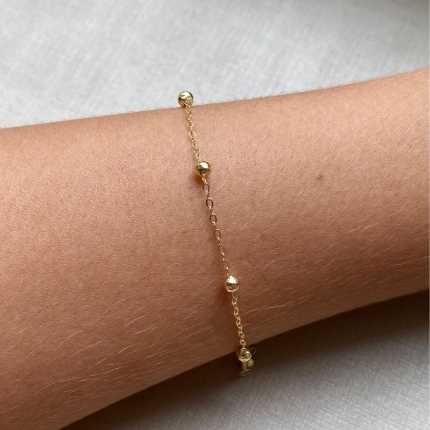 Pulseira com 6 Bolas de 3mm em Ouro Amarelo 18K-750