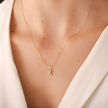 Pingente Letra K em Ouro Amarelo 18K-75, com zircônias