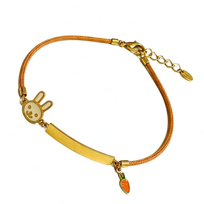 Pulseira em Ouro 18K infantil com Coelho em Resina, chapinha e Algodão