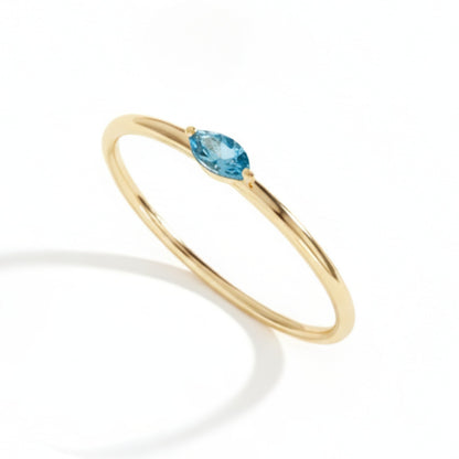 Anel Topázio Azul Coleção Doze Essências em Ouro Amarelo 18K-750