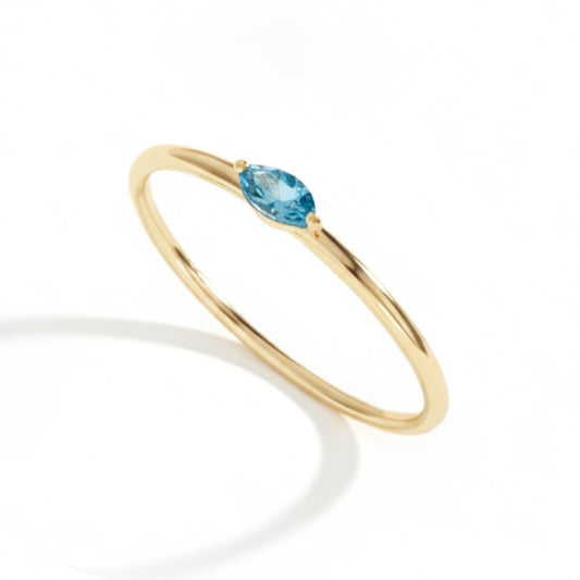 Anel Topázio Azul Coleção Doze Essências em Ouro Amarelo 18K-750