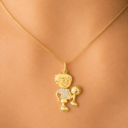Pingente em ouro amarelo 18k menino jogando bola