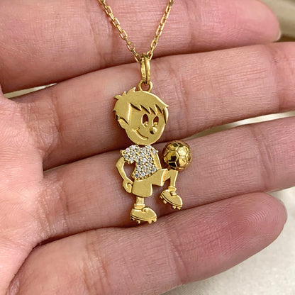 Pingente em ouro amarelo 18k menino jogando bola